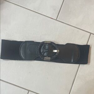 Black wide stretchy belt with full leather and silver accent.
